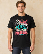 Model standing Be Kind To Your Nurse We Pick The Needles T-shirt in Black