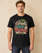 Model standing current status reading T-shirt in Black
