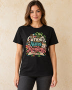 Model standing current status reading T-shirt in Black