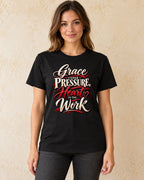 Model standing Grace Under Pressure Heart In The Work T-shirt in Black