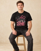 Model seated Living The Shift T-shirt in Black