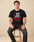 Model seated 12 Hours of Heart T-shirt in Black
